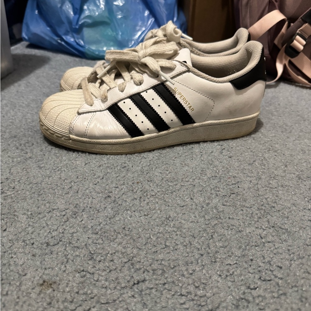 Adidas white and black superstars